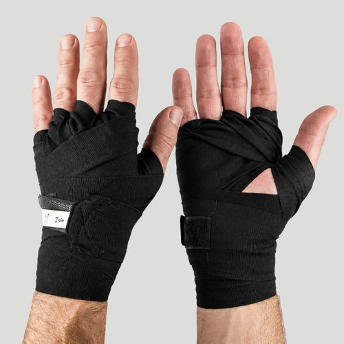 Black fingerless gym wrapping gloves shown on both hands against a light gray background, displaying the front and back wrap designs.